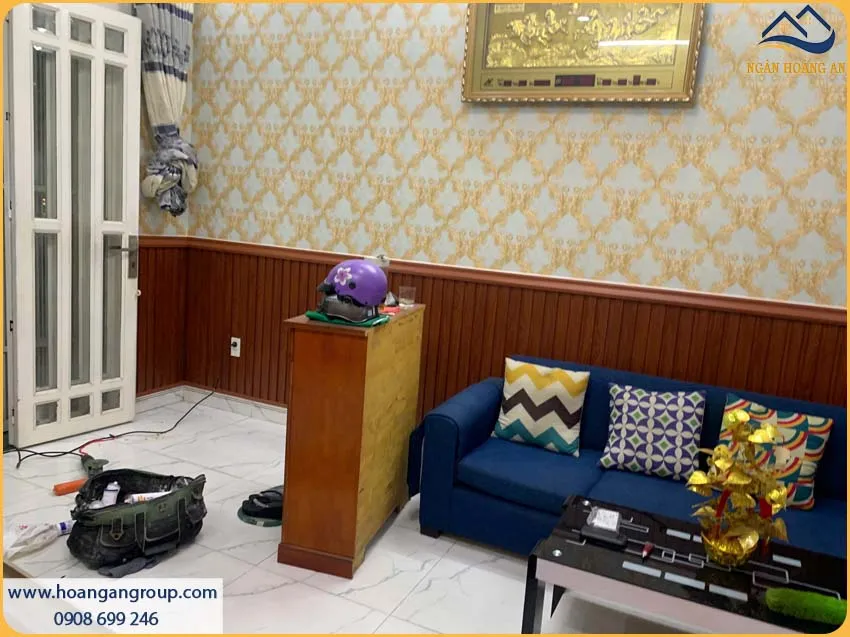 Công Trình Ốp Lamri Lam Sóng Giả Gỗ Hoàn Thiện Phòng Khách