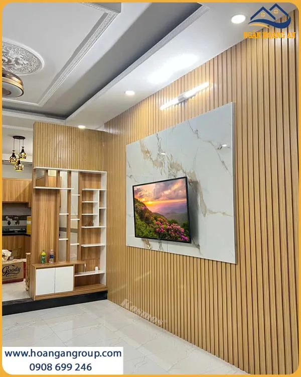 Mảng Tường Tivi Ấn Tượng Với PVC Giả Đá Và Lam Sóng