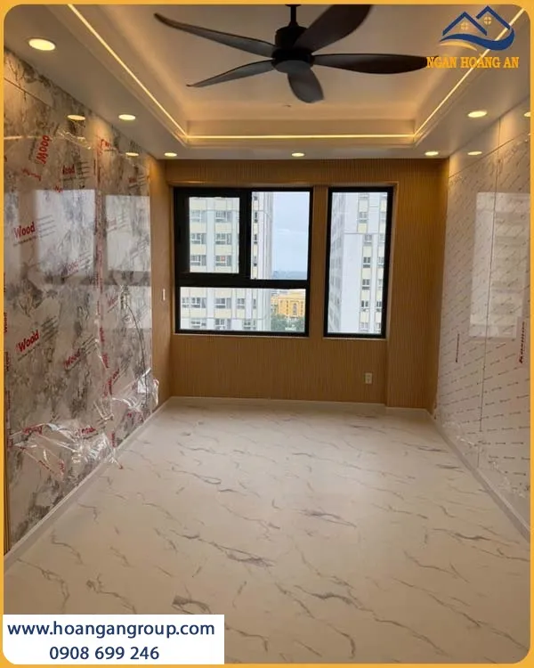 Phòng Khách Được Ốp Tường Bằng Tấm Than Tre iWood Và Lam Sóng Phòng Khách Được Ốp Tường Bằng Tấm Than Tre iWood Và Lam Sóng